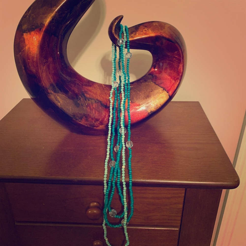 Three groups of necklaces.Blue & Green